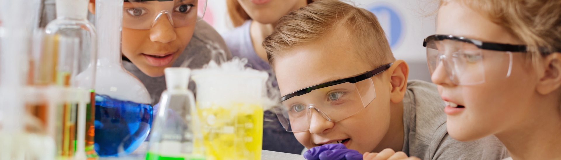 students being amazed by chemical reaction